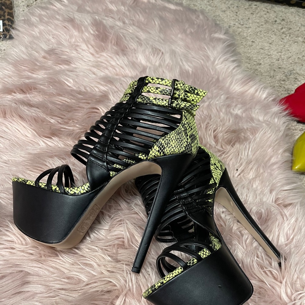 Green and black heels